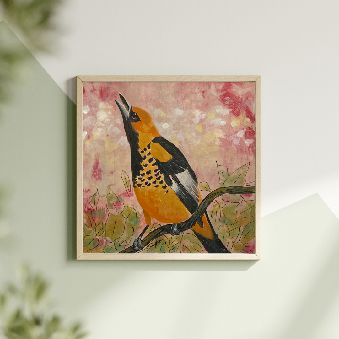 Framed artwork of a bird on a branch with a floral background by artist Tonya Henderson.