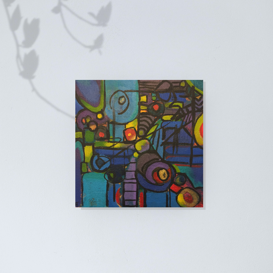 Abstract artwork with vibrant colors in shapes with black lines on a light gray wall by artist Tonya Henderson.