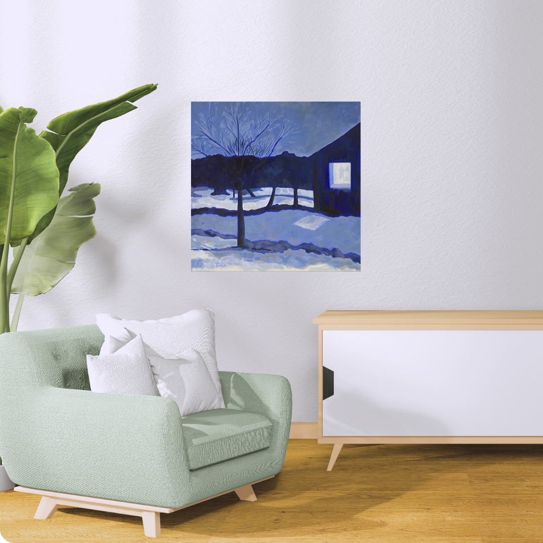 Modern living room with a green armchair, white pillows, and a painting of a snowy landscape on the wall.