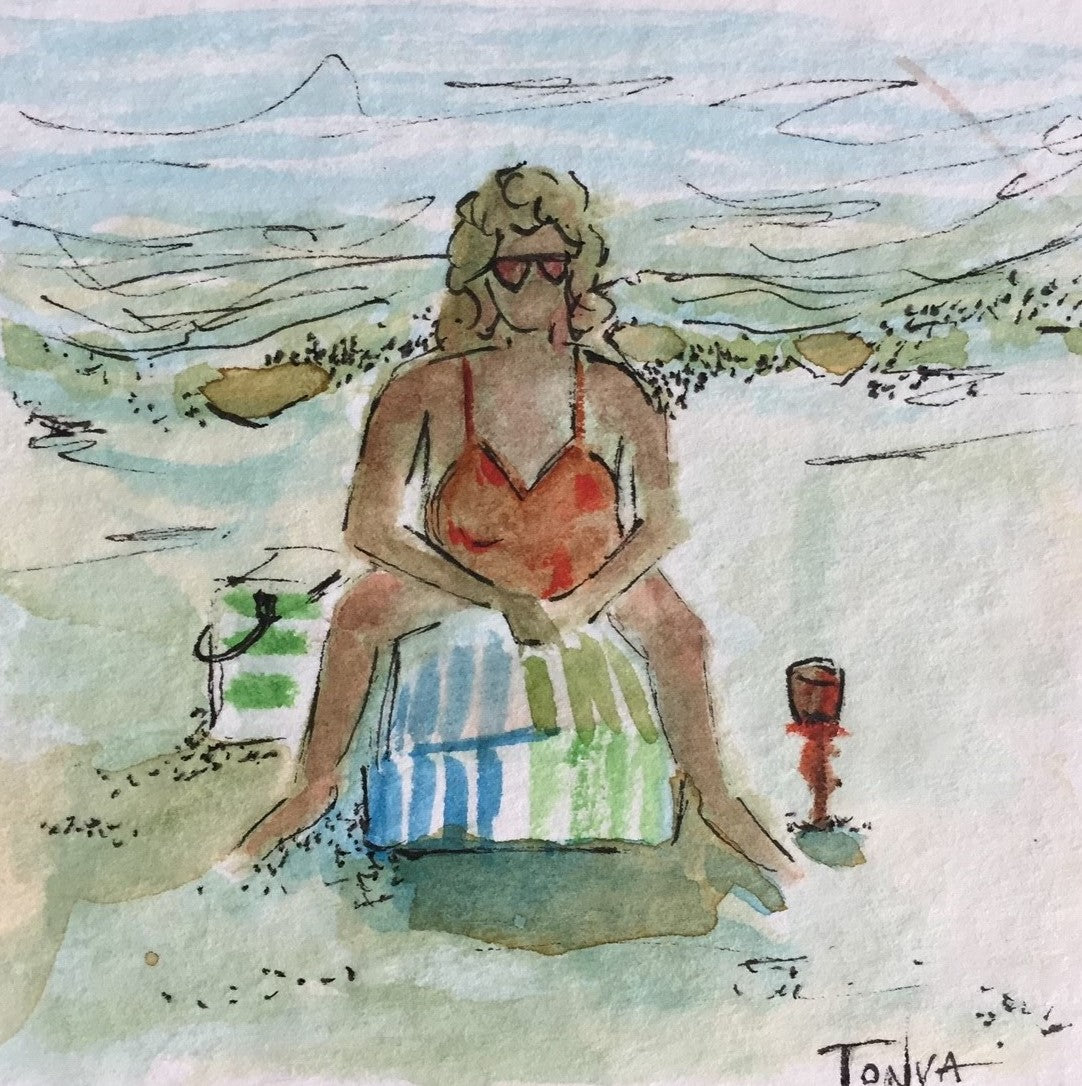Woman in a bathing suit sitting on the beach in a lounge chair with a cooler by her side and the ocean waves behind her, an original watercolor painting by artist Tonya Henderson.